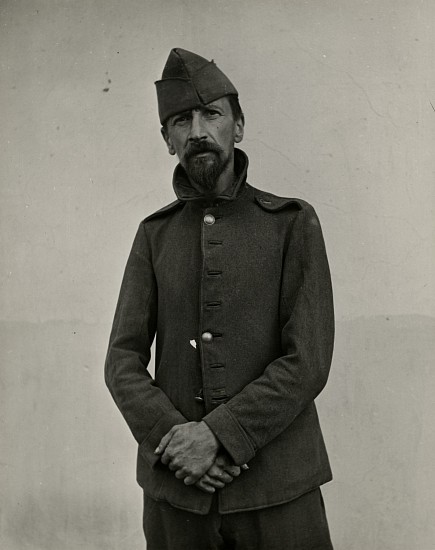 Eliot Elisofon, Concentration Camp in French Morocco, 1942
Vintage gelatin silver print, 9 1/4 x 7 1/2 in. (23.5 x 19.1 cm)
Riben - Russian Jew- in French Foreign Legion since Brest-Litovsk was with 13th artillery regiment in Morocco. Sent to a work camp by German Armistice Commission. Unfit for work now. Still wearing For. Leg. uniform.
(Sold as part of a group of 18 prints)
6107