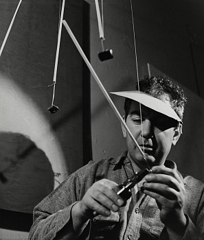 Herbert Matter - Alexander Calder working on Swizzle Sticks, New York City storefront studio, winter