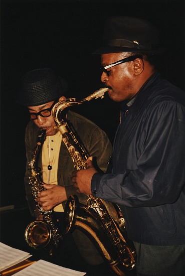 Jim Marshall, Johnny Hodges and Ben Webster at the Cellar Jazz Club S.F., 1960
Chromogenic print, 12 3/4 x 8 3/8 in. (32.4 x 21.3 cm)
Johnny Hodges (1907-1970) was one of the most important alto saxophonists in jazz history, best known for his solo work with Duke Ellington's orchestra. Ben Webster (1909-1973), tenor saxophonist, considered one of the three most important "swing tenors", along with Coleman Hawkins and Lester Young. Signed by the photographer.
7395
Sold