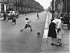 Roger Mayne, View With Footballers, Southam Street, London
1956, Gelatin silver print, printed 2001